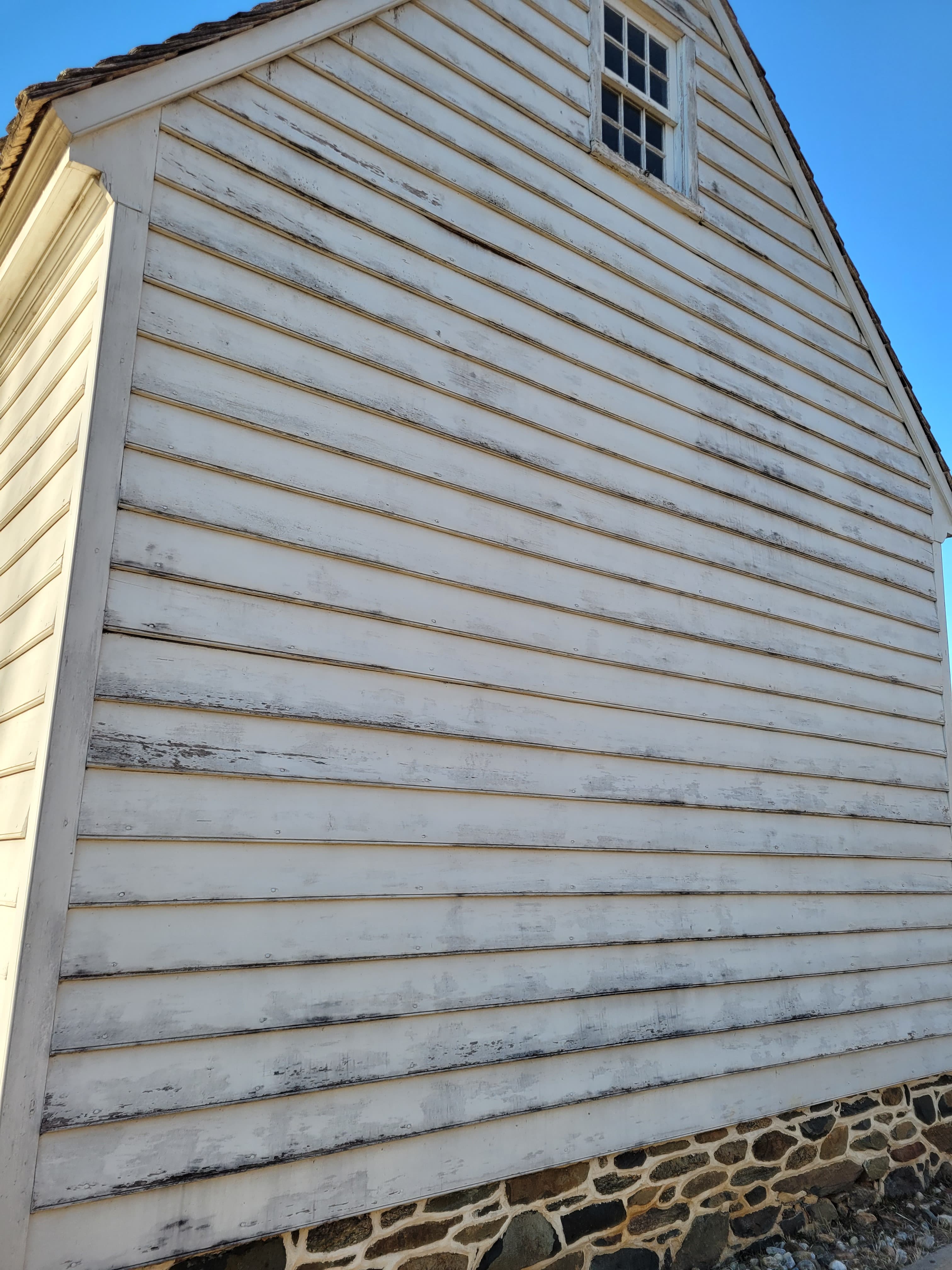 Chipped paint on the building's exterior