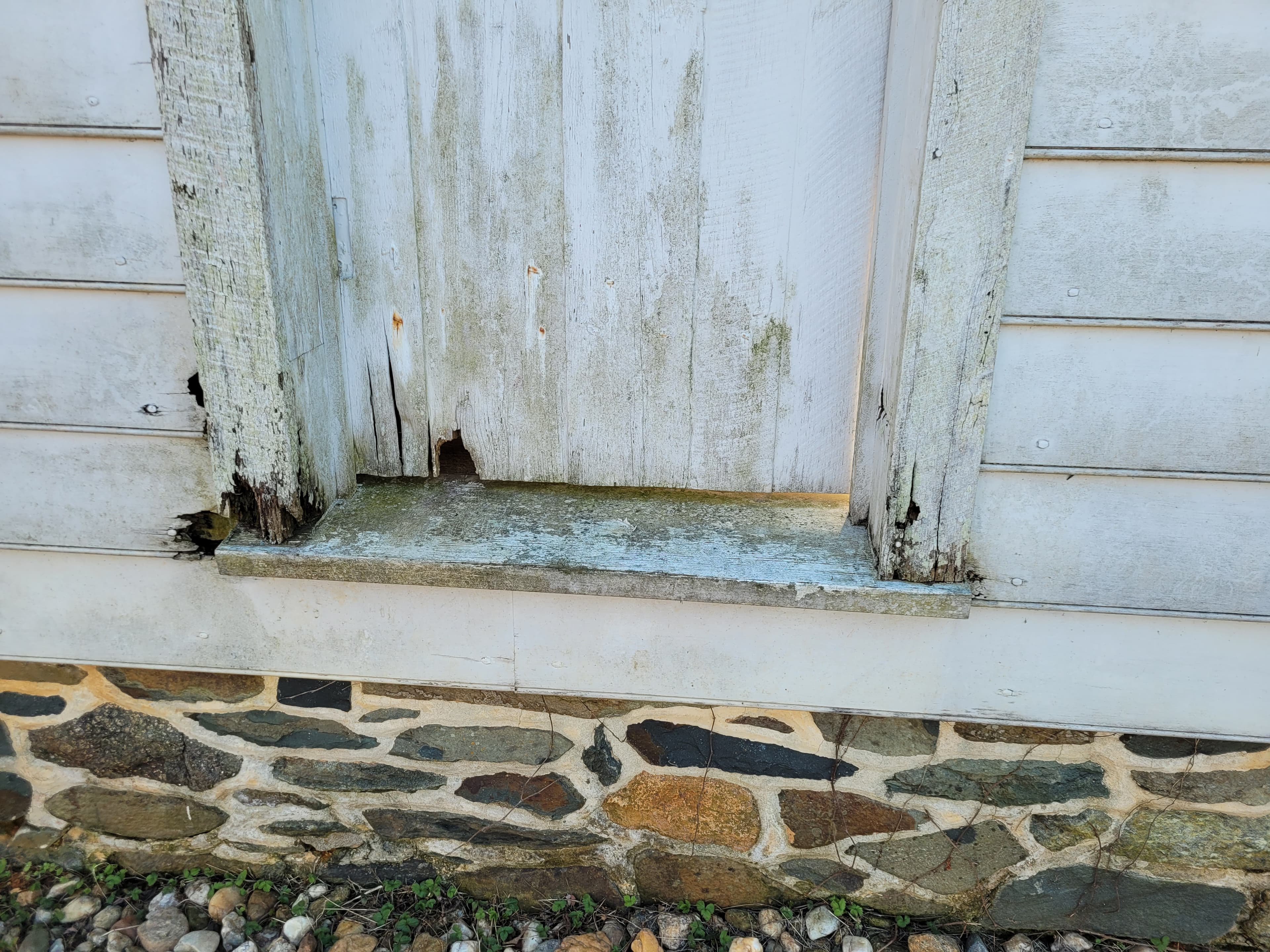 Rotted wood on the building's exterior